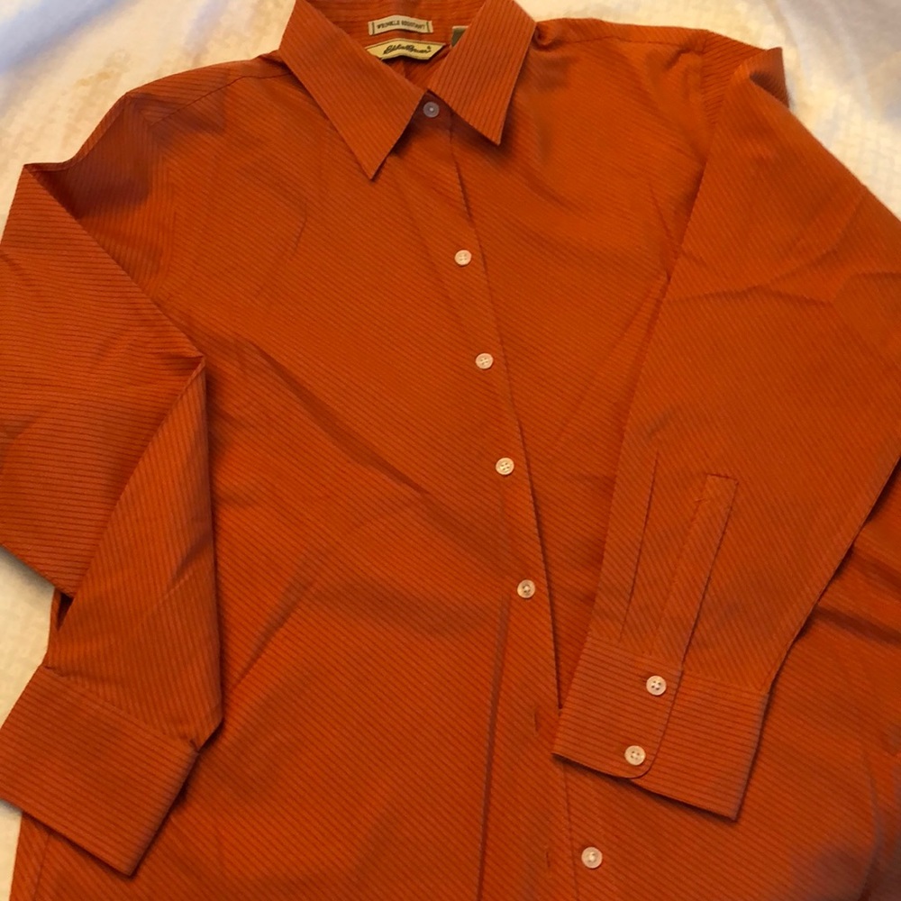 I am selling a wrinkle resistant Eddie Bauer extra large women’s shirt.